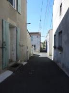 Petites habitations accolées dans une ruelle près de la rue Nationale (rue Guérin).