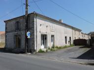 Ferme, épicerie, actuellement maison et magasins de commerce, 87 et 89 rue Georges-Clemenceau