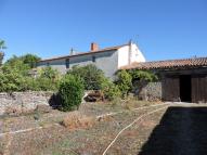 Ferme dite la cabane de la Touchantée, actuellement maison, 10 rue des Prés bas