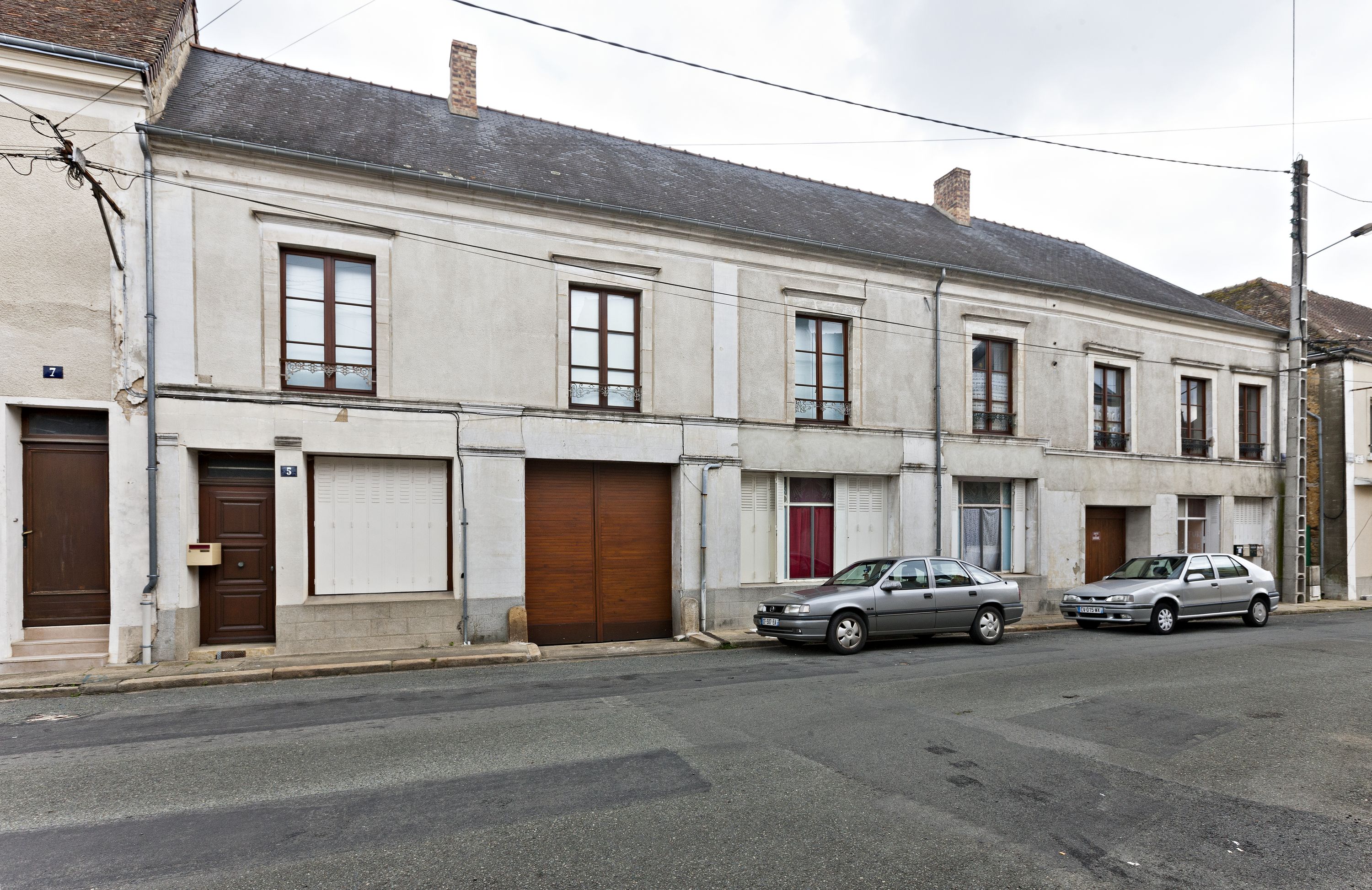 Immeuble et magasin de commerce, 1-5 rue Clémenceau à Bonnétable, actuellement immeuble à logements.