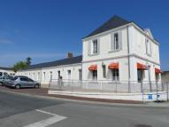 Ecole primaire publique de garçons et mairie puis bureau de poste, actuellement salle des fêtes, salle de musique et charcuterie