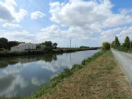 Le canal de Pomère au niveau de la Victorine, vu depuis l'amont, rive droite.