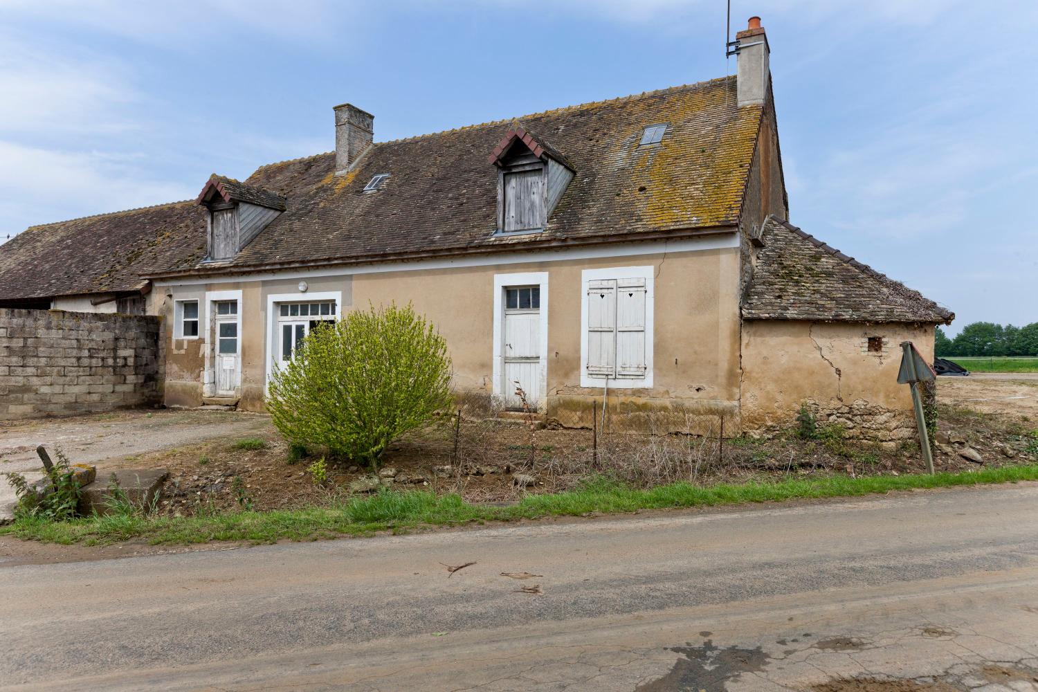 Ensemble d'édifices à cour commune, actuellement maison et ferme