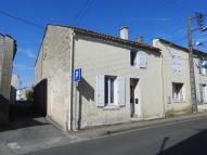 Auberge du Lion d'Or, actuellement maison, entrepôt commercial, 38 rue Georges-Clemenceau et rue du Lion-d'Or