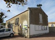 Salles des œuvres post-scolaires, puis salle des fêtes, caserne de pompiers, actuellement ateliers municipaux